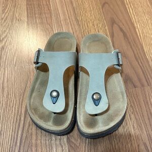 Women's Tan Cushionaire Thong Sandals with Leather and cork footbed.